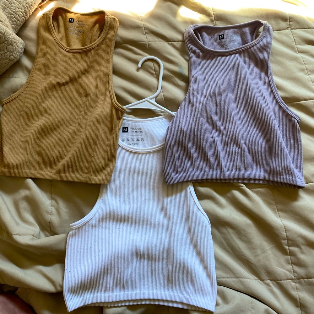 THREE sports tank tops